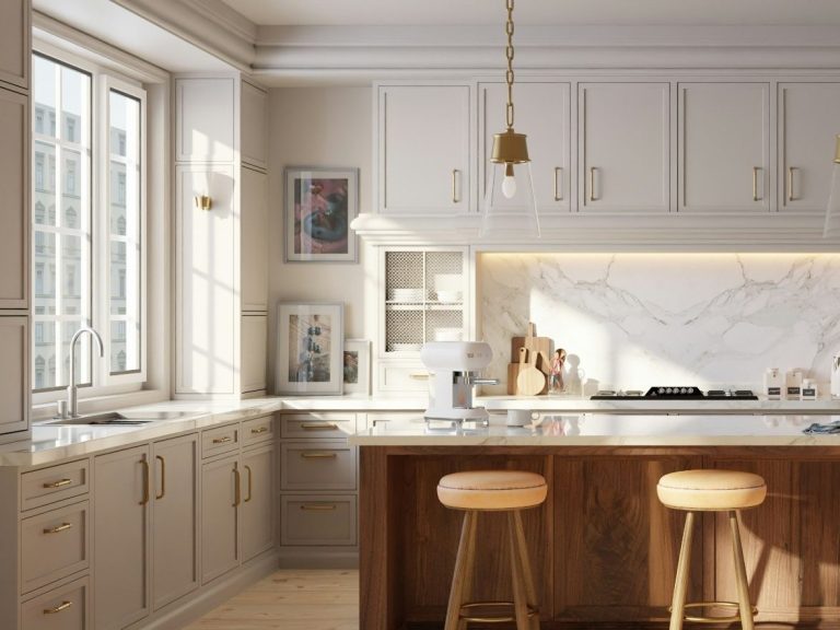 Modern kitchen with marble countertops, light cabinets, and gold accents in Marco Island, FL.