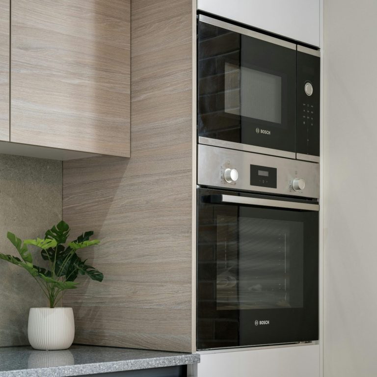 New microwave and oven installed into the wall in Marco Island.